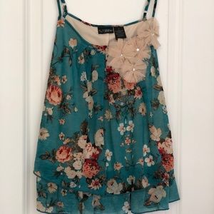 Blue flower print top with flower embellishment